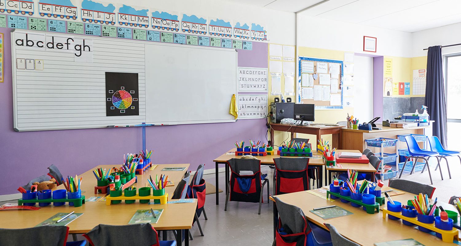 empty-classroom-in-elementary-school-with-whiteboa-2021-08-26-16-14-26-utc-light
